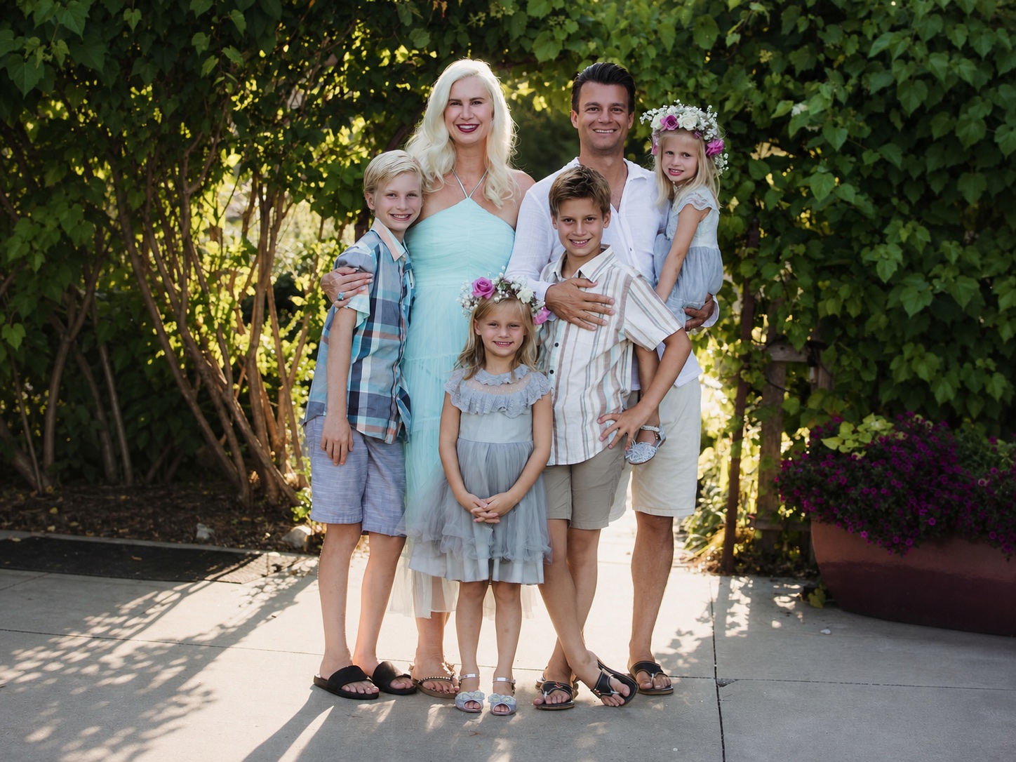 The Benedict family together in a garden